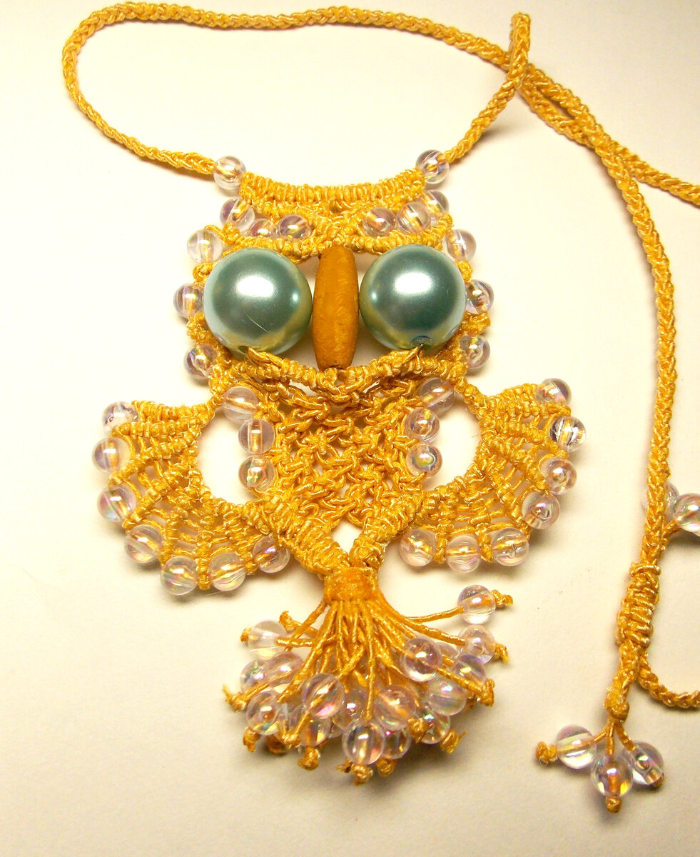 Кулон - оберег совушка.