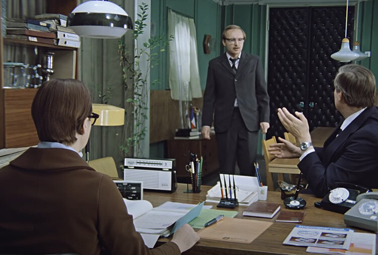 Анатолий заходит в кабинет