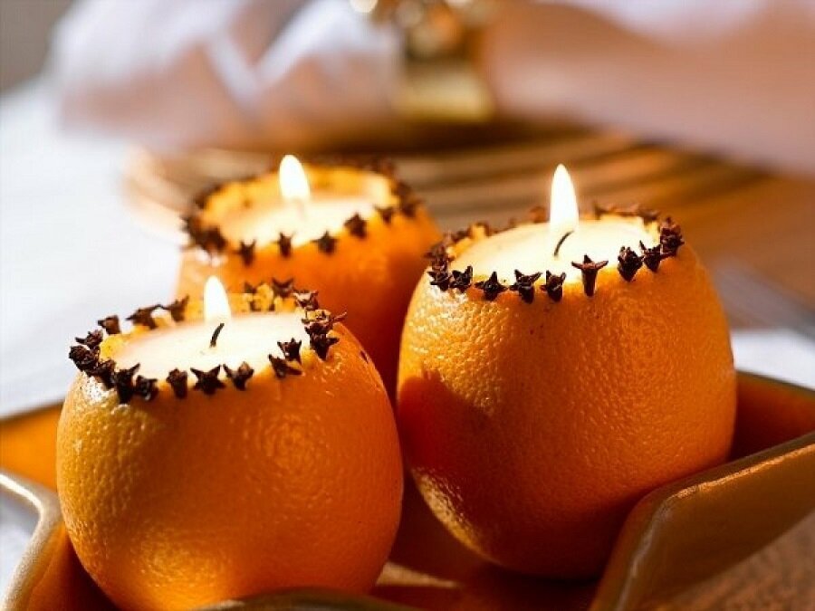 Подсвечник из апельсина. Свеча из апельсина. Свечи с апельсином. Свечи из мандаринов. Свеча мандарин