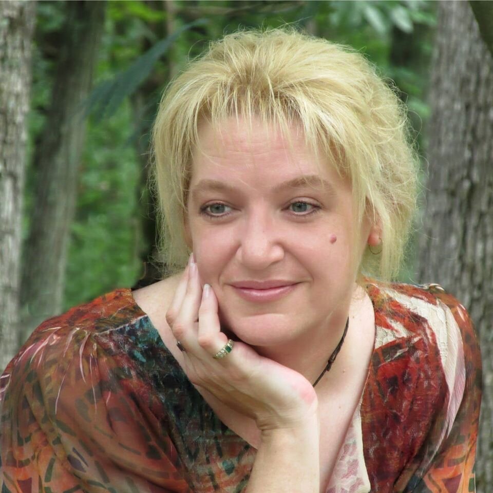 Джина Холланд