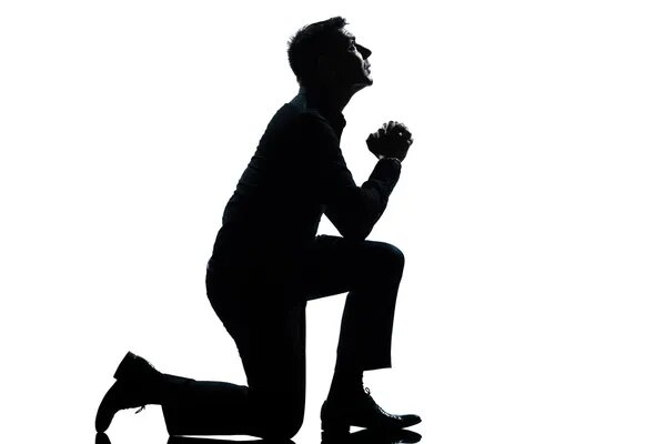 https://static8.depositphotos.com/1424188/891/i/600/depositphotos_8911769-stock-photo-silhouette-man-kneeling-praying-full.jpg