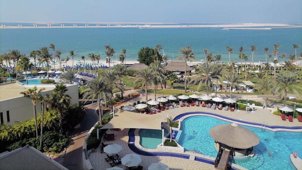    Вид на бассейн и пальму комплекса JA The Resort Dubai© РИА Новости / Светлана Баева