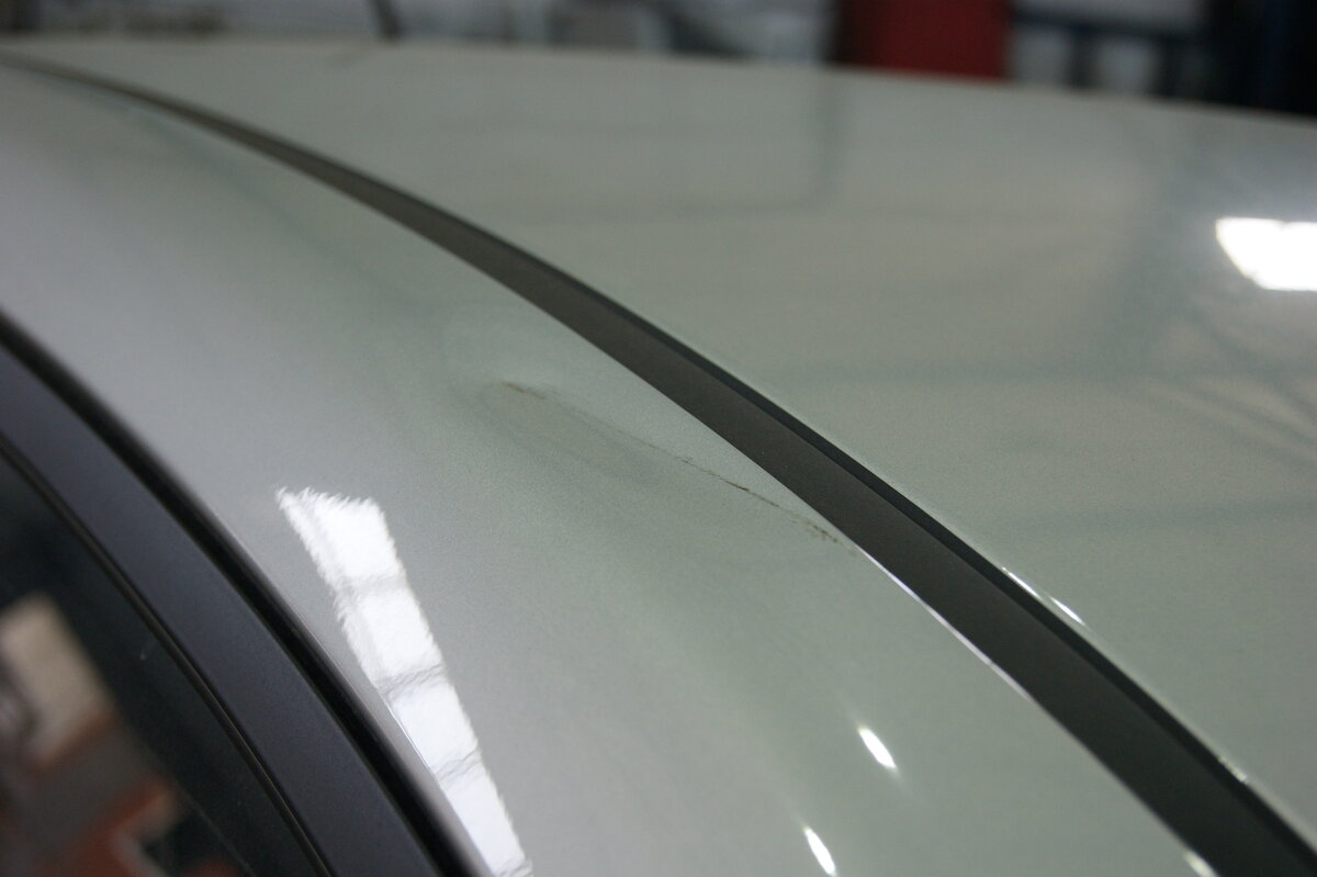 Незначительная вмятина до металла 