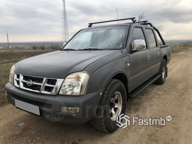 
Это  довольно неординарный экземпляр как по дизайну, так и по  характеристикам. Больше похож на универсал, длина которого увеличена в  полтора раза, чем на пикап.
