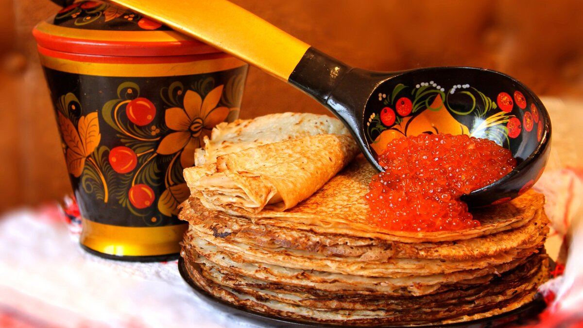 Автор неизвестен. Источник: https://www.zastavki.com/pictures/originals/2017Holidays___Carnival_Russian_feast_on_Shrove_Tuesday_111504_.jpg