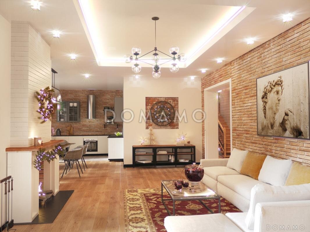 Пример дизайна кухни-гостиной в загородном доме