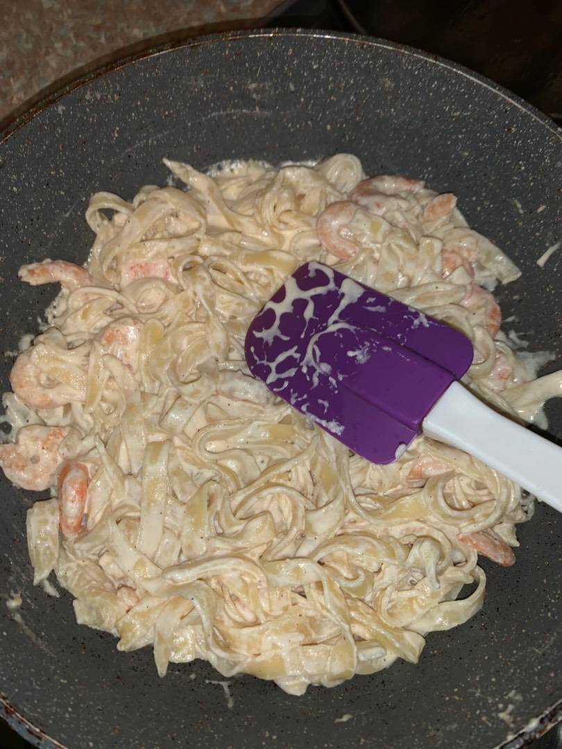 Спагетти с чернилами каракатицы в сливочном соусе с морепродуктами «Insolito»