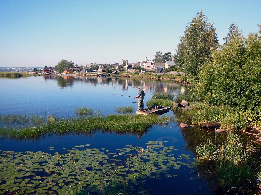 Рыбак в Соломенном. Современное фото   