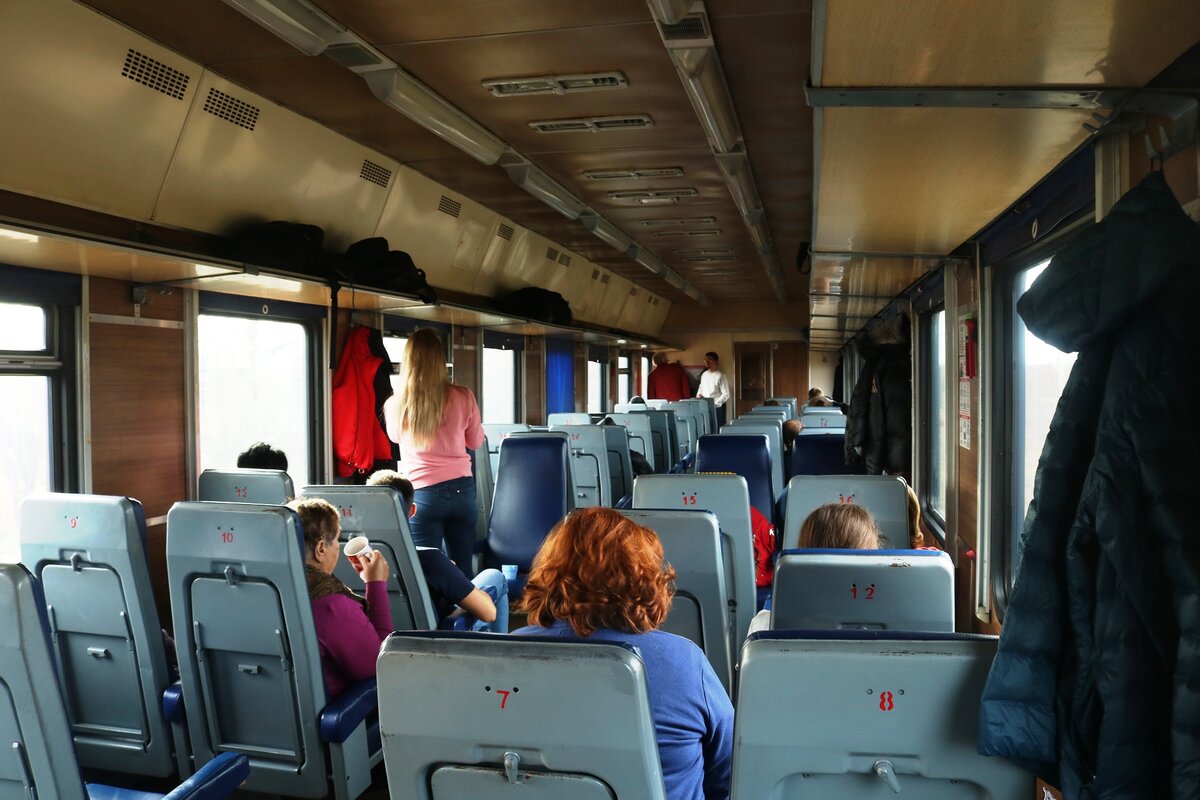 Как выглядит сидячий вагон в поезде дальнего следования ржд фото