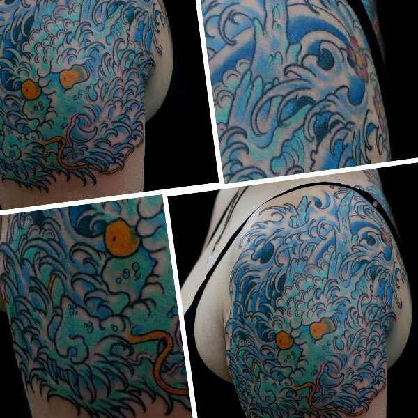 Ещё тату с водяным.