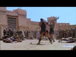 Аякс сбивает Гектора с ног...