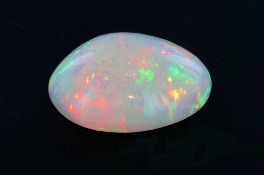 Опал арлекин камень. Опал потемнел. Опал афганский. Джиразоль голубой опал. Опал потемнел.