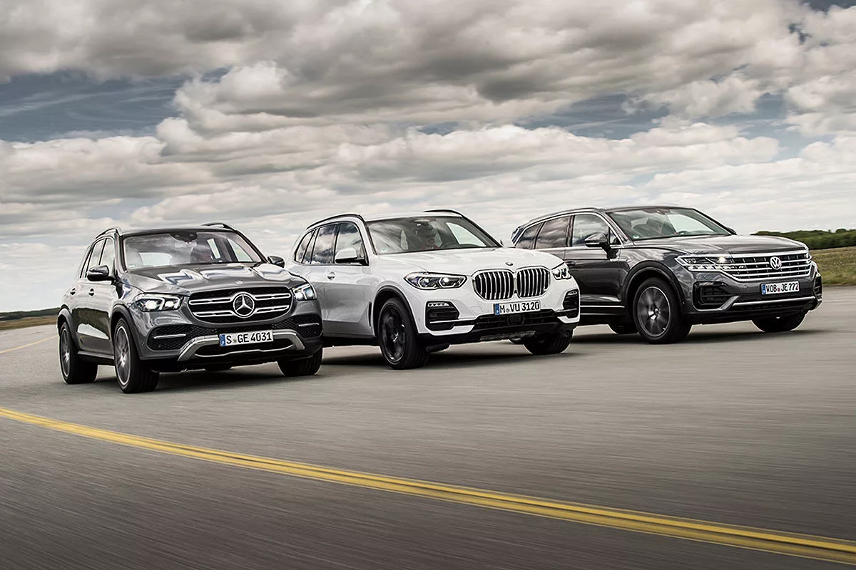 Туарег сравнение. BMW x5 vs Mercedes GLE 2019. Volkswagen Touareg vs BMW x5. Volkswagen Touareg 2020 vs BMW x5. Audi q7 vs Volkswagen Touareg.