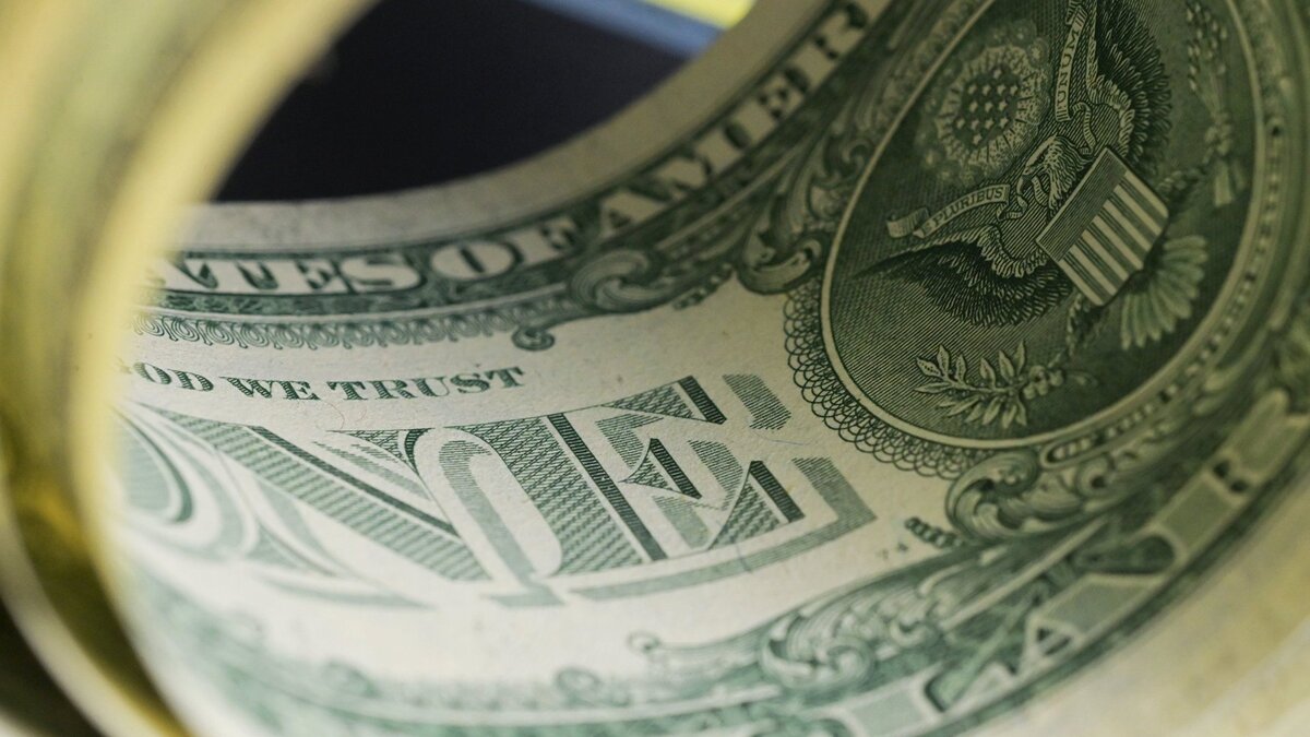    " Денежные купюры США.© РИА Новости . Владимир Трефилов