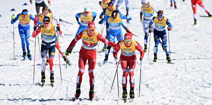 А.Большунов передает Эстафету Г.Ретивых. Взято из открытых источников