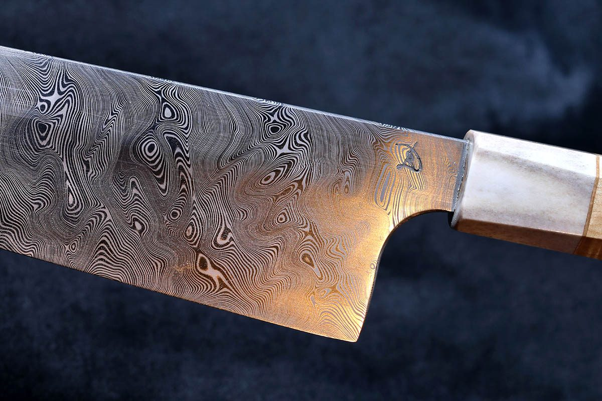 Сталь для ножей плюсы. Дамастил. Damasteel Odinheim. Дамаскированная сталь. Букетный Дамаск сталь.