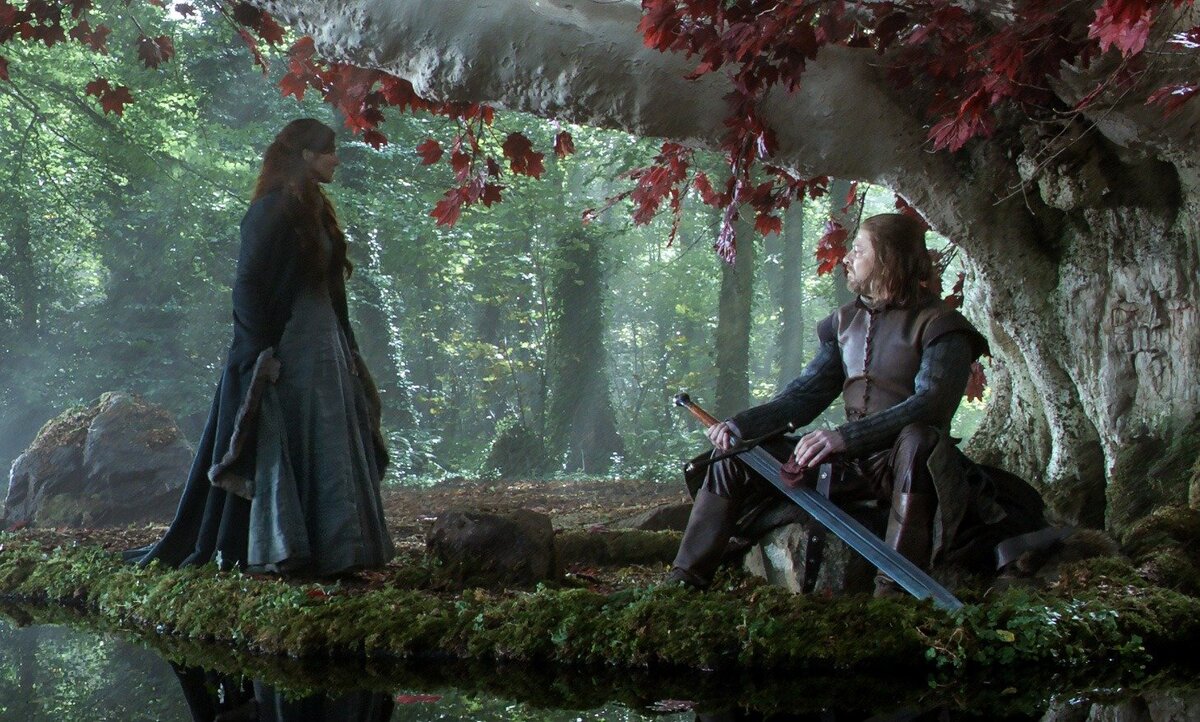 Кейтилин  и Нед Старки в богороще у чардрева. Источник: https://7kingdoms.ru/story/weapon-against-white-walkers/