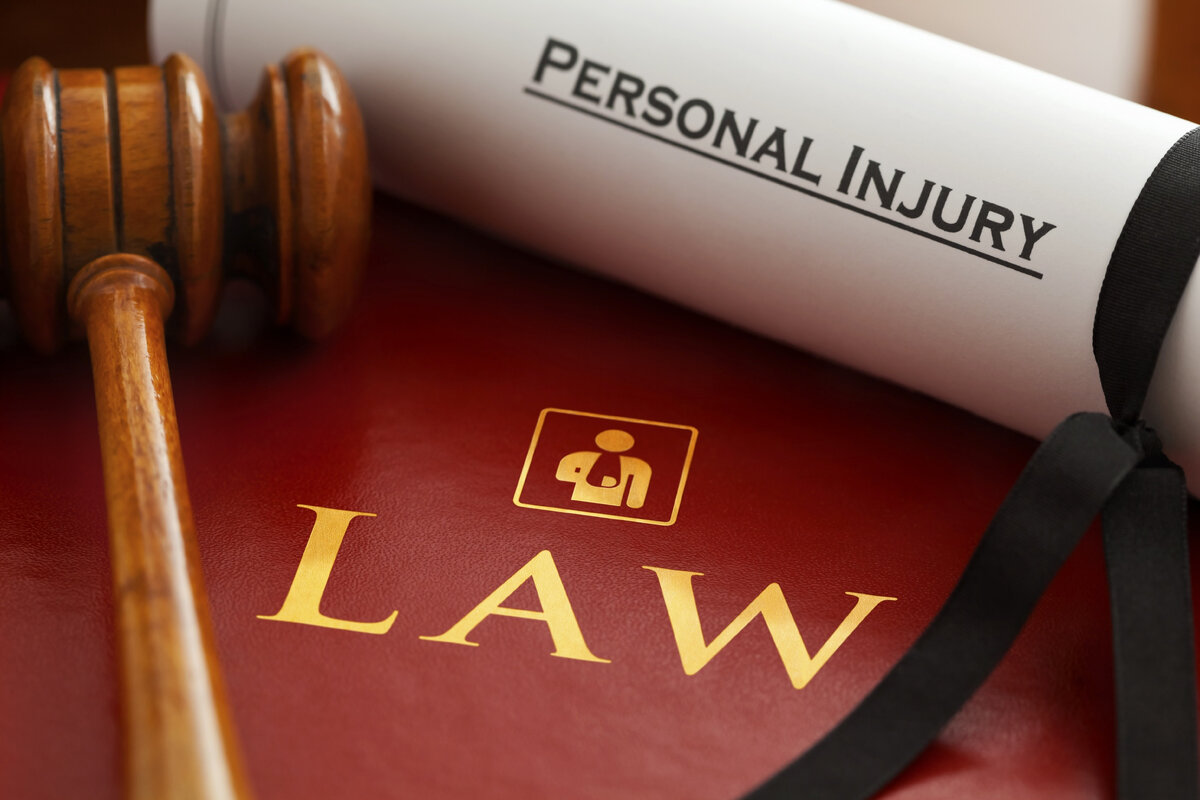 https://www.canva.com/photos/MADQtswILx8-law-book-and-personal-injury-claim/