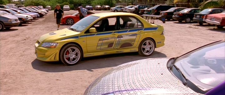 Кадр с Mitsubishi Lancer Evolution VII 2002 года из фильма «Двойной форсаж» 2003 года
