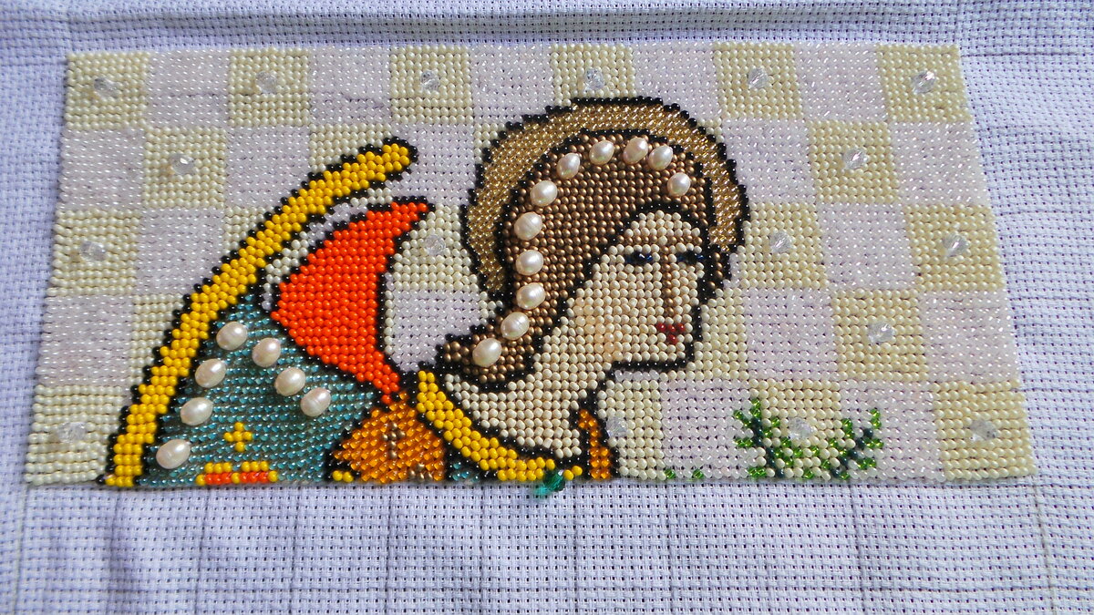 Процесс вышивки по канве