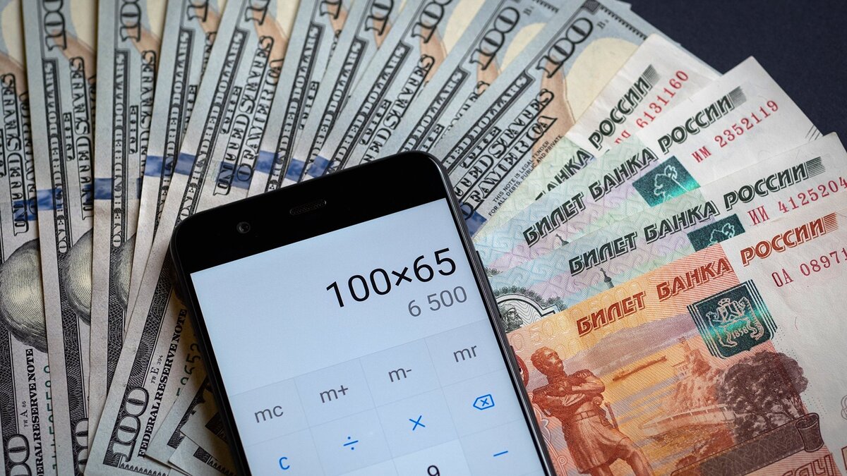    Доллары и рубли© РИА Новости . Виталий Тимкив