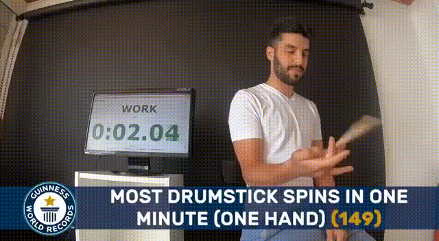 Рекордное вращение барабанных палочек