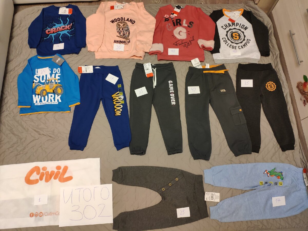 Столько купили на 3000 рублей. Все кроме синего костюма хлопок. 