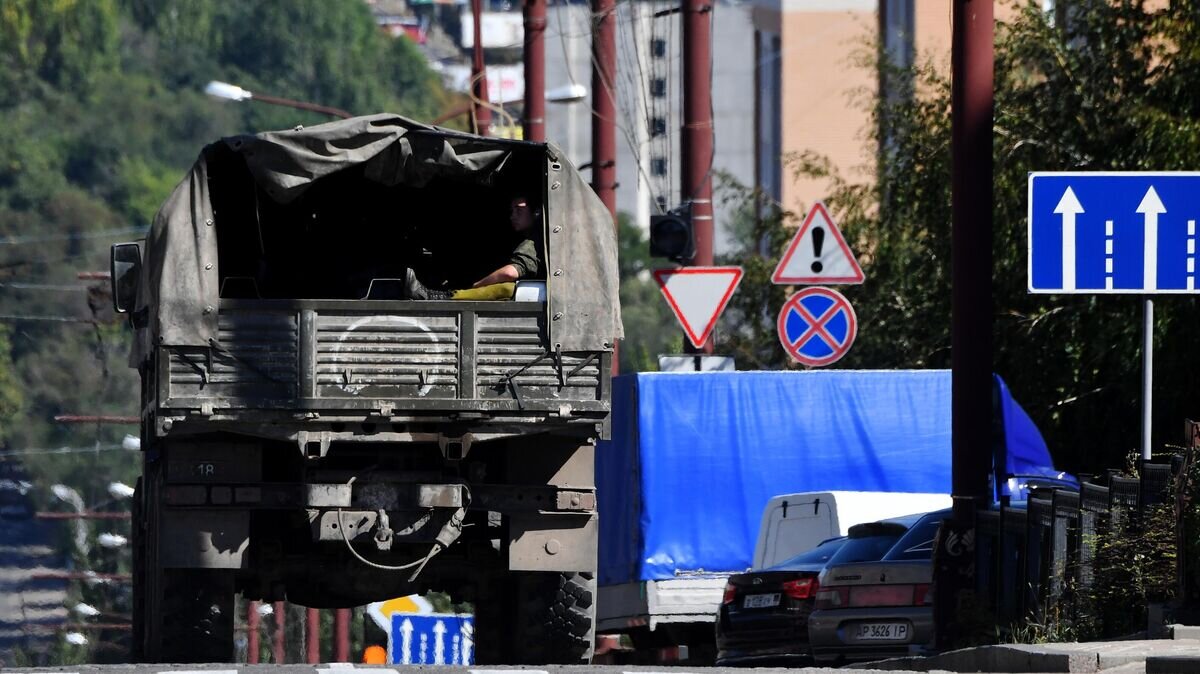    Военный автомобиль в Донецке© РИА Новости