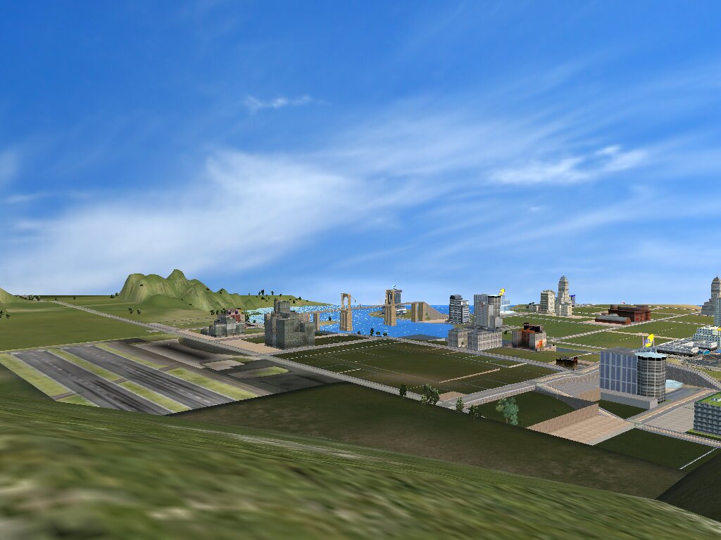 Вид строящегося города с высокого холма.