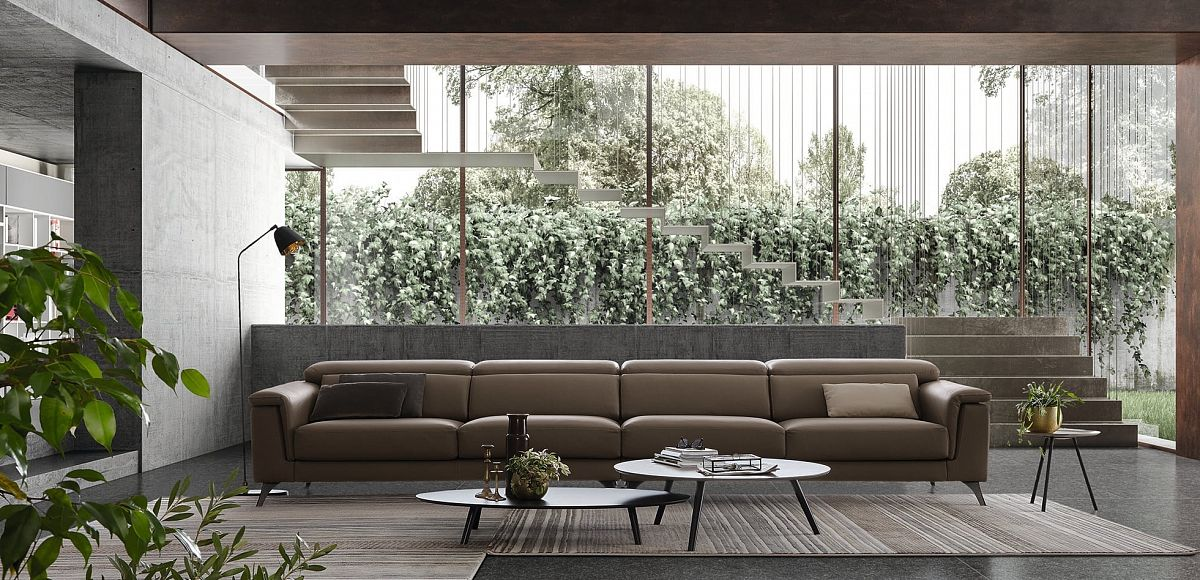 Бетонне стены, полы и ступени в интерьере гостиной в стиле минимализм. Автор проекта - Colombini  Casa Studio