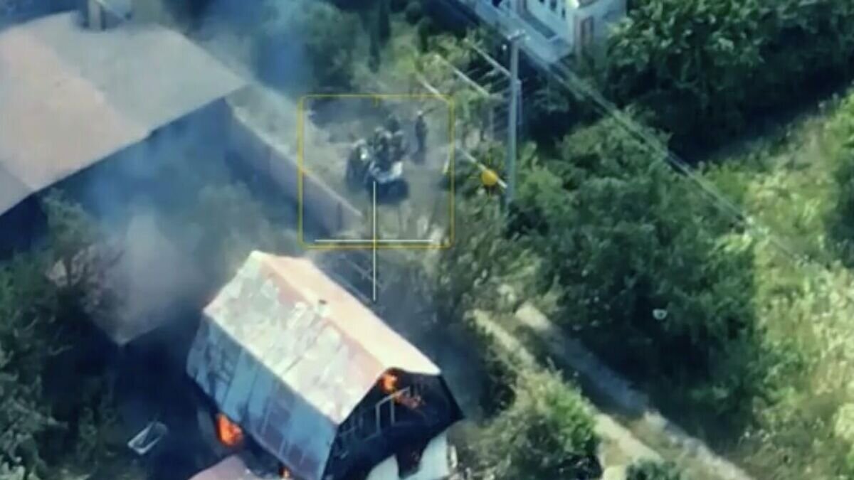    Кадр видео уничтожения базы иностранных наемников в Харьковской области© РИА Новости