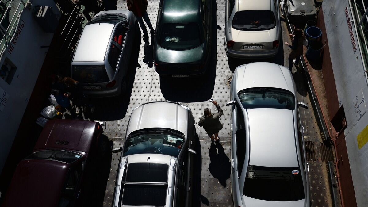    Автомобили на пароме Керченской паромной переправы© РИА Новости / Константин Чалабов