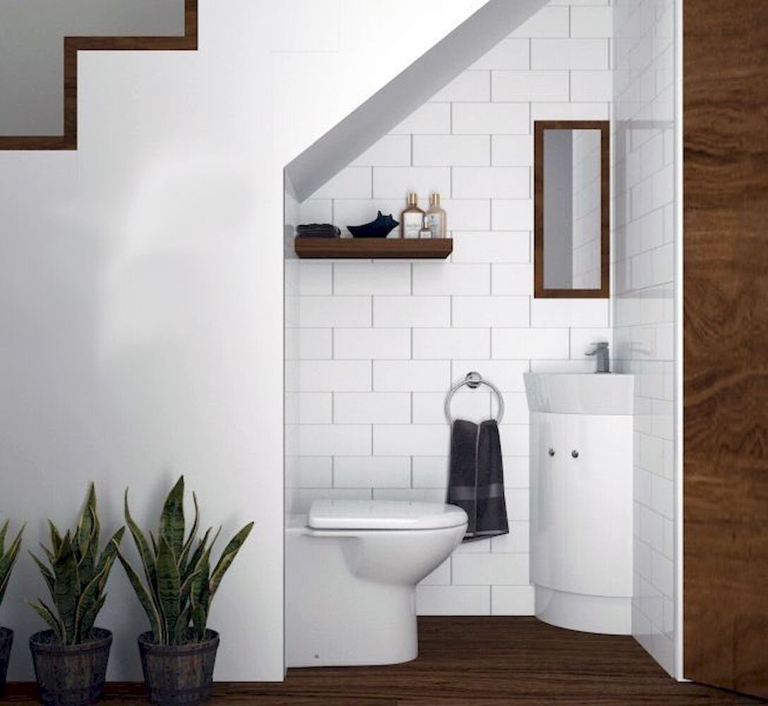 https://cdn.homedit.com/wp-content/uploads/2019/09/Under-the-staircase-powder-room.jpg