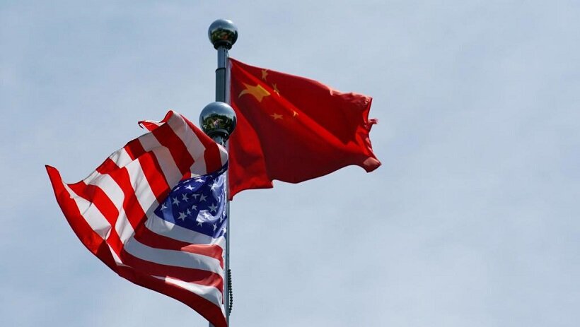 Китайско-американские торговые переговоры возобновились в Шанхае, а китайские и американские флаги развевались на Бунде.