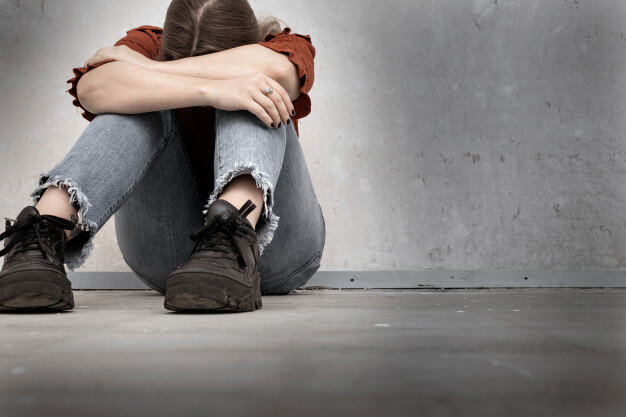 https://image.freepik.com/free-photo/young-woman-cries-sitting-near-empty-wall-lonely-sad-depressed-girl-holding-her-head-down_158001-8.jpg