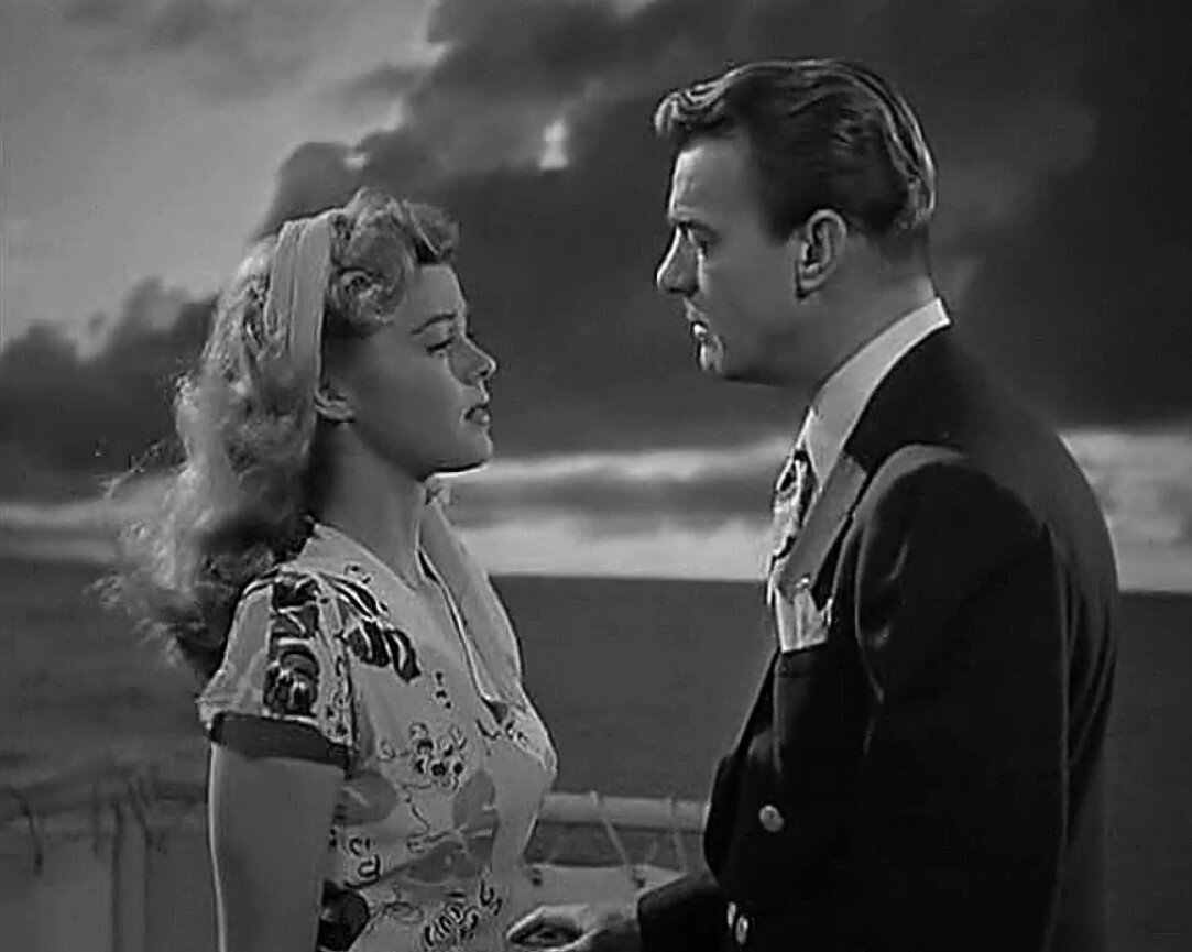 Брустер пытается объяснить Пегги свое поведение.