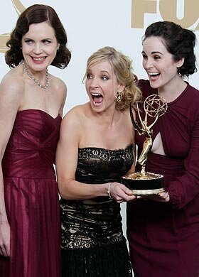 Downton Abbeycast members (l-r) Elizabeth McGovern (Cora, Countess of Grantham), Joanne Froggatt (Anna) and Michelle Dockery (Lady Mary Crawley) pose for a photograph backstage at the Emmy Awards in Los Angeles
