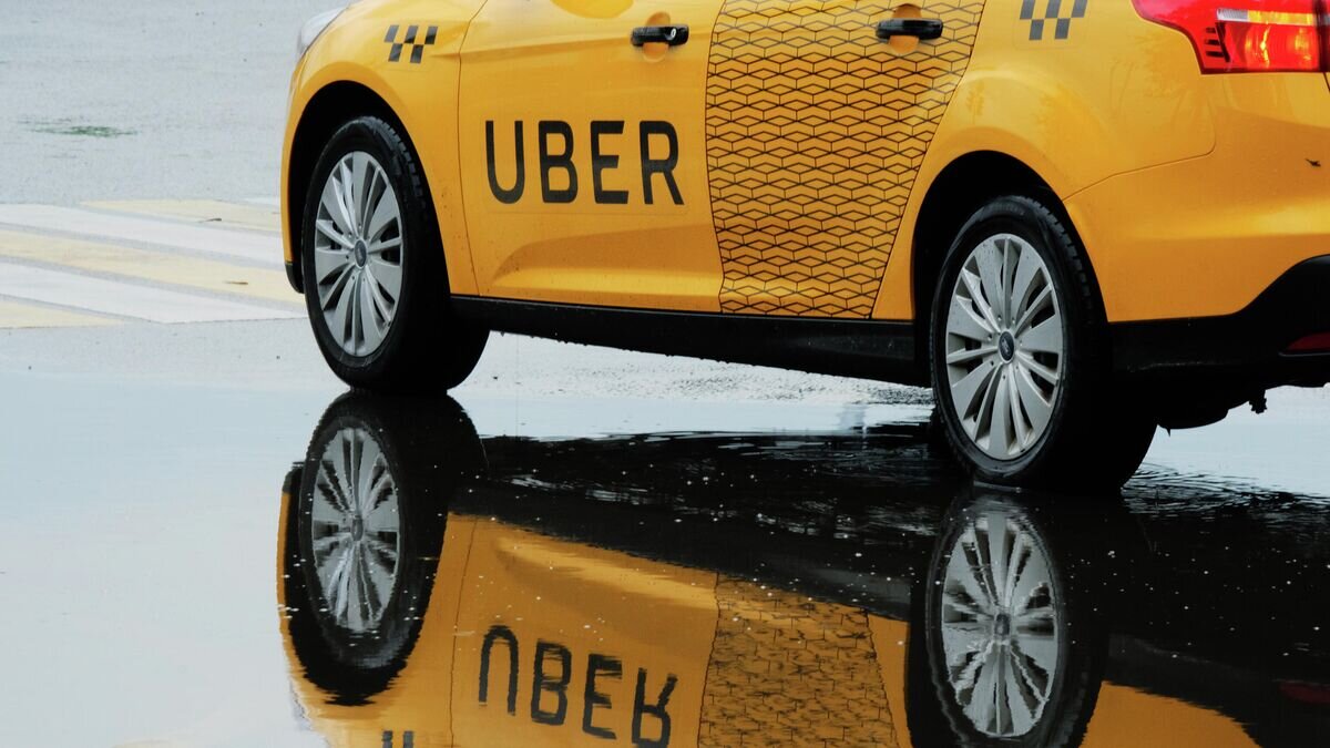    Автомобиль службы такси Uber© РИА Новости / Наталья Селиверстова