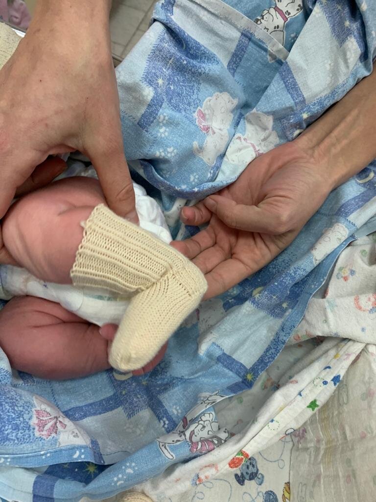 вязаные носочки для новорожденного