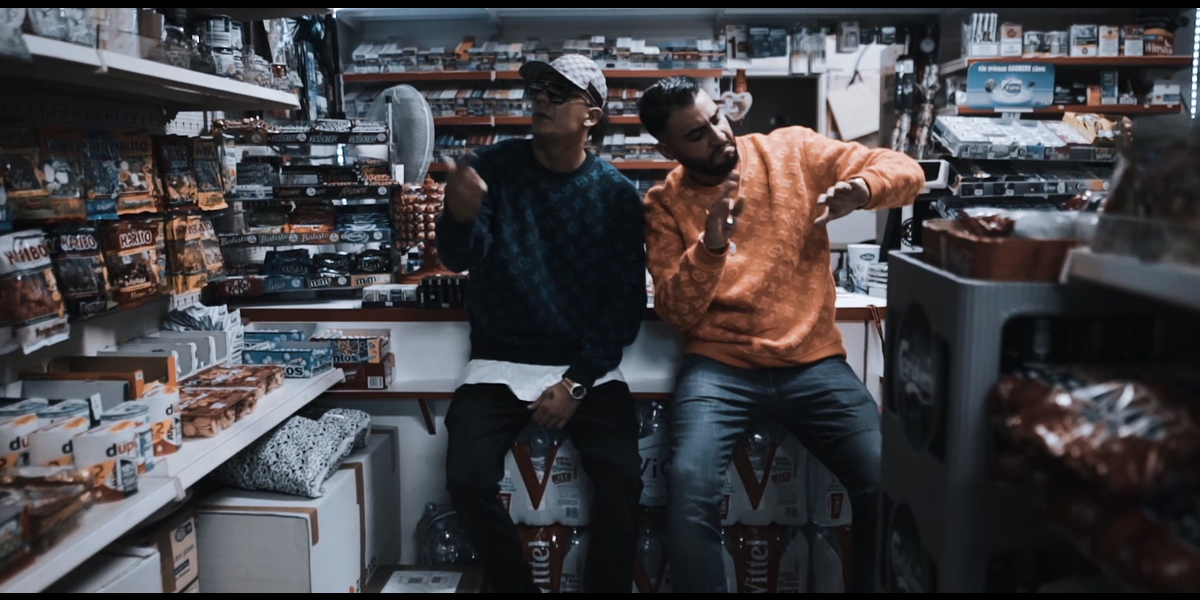 Кадр из клипа. Слева Capital Bra 