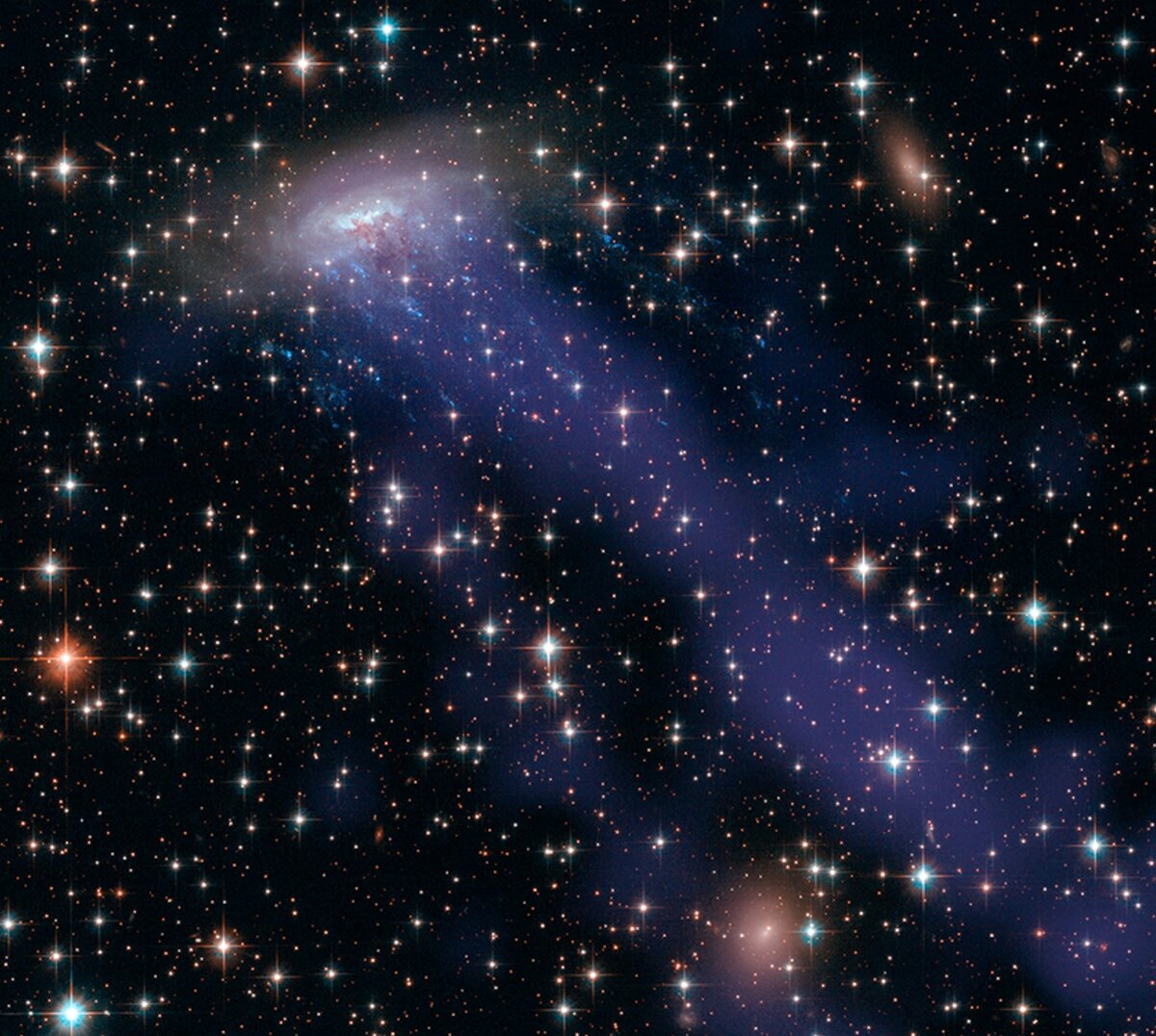 ESO 137-001 комбинированное изображение (оптический и рентгеновский диапазон, фото nasa.gov)