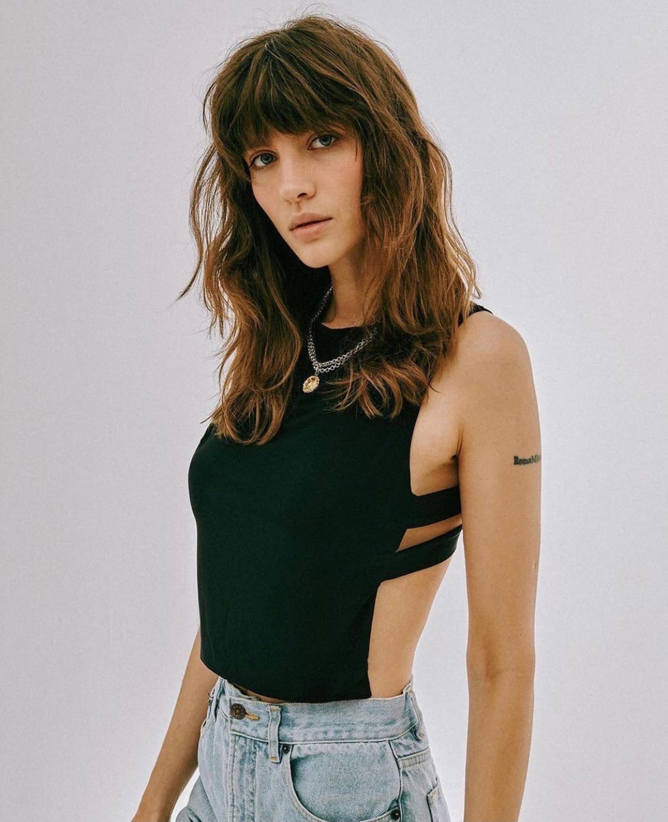 Рома Милова