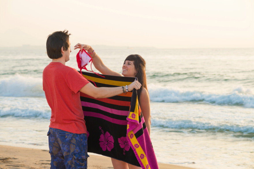 Girls Changing Clothes On Beach