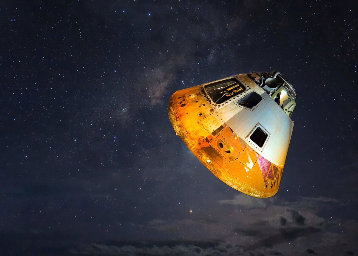 https://www.pexels.com/photo/grey-and-orange-spaceship-700015/