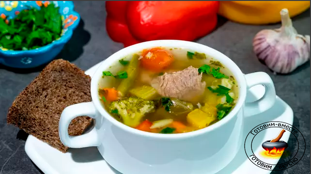 Густой мясной суп с овощами.