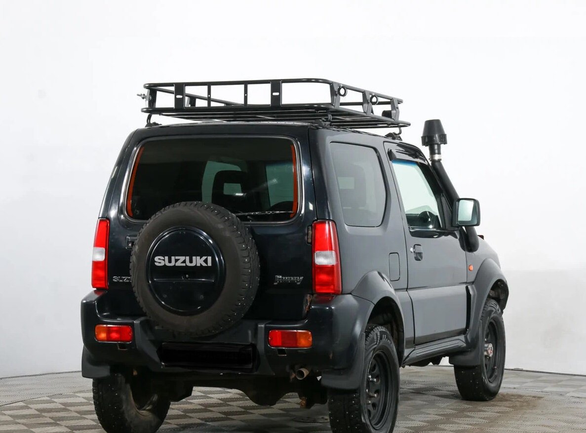 Сузуки джимни 1.3. Suzuki Jimny III. Сузуки Джимни 3 Рестайлинг. Suzuki Jimny III Рестайлинг 1, 2007. Сузуки Джимни на больших колесах.