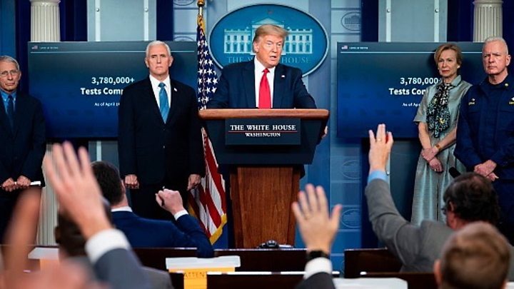 Media captionTrump says some states are too tough with restrictions