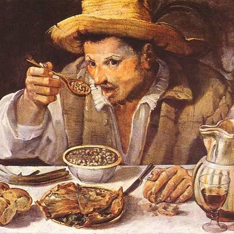 Обед состоящий из похлёбки, лепёшек и хлеба.