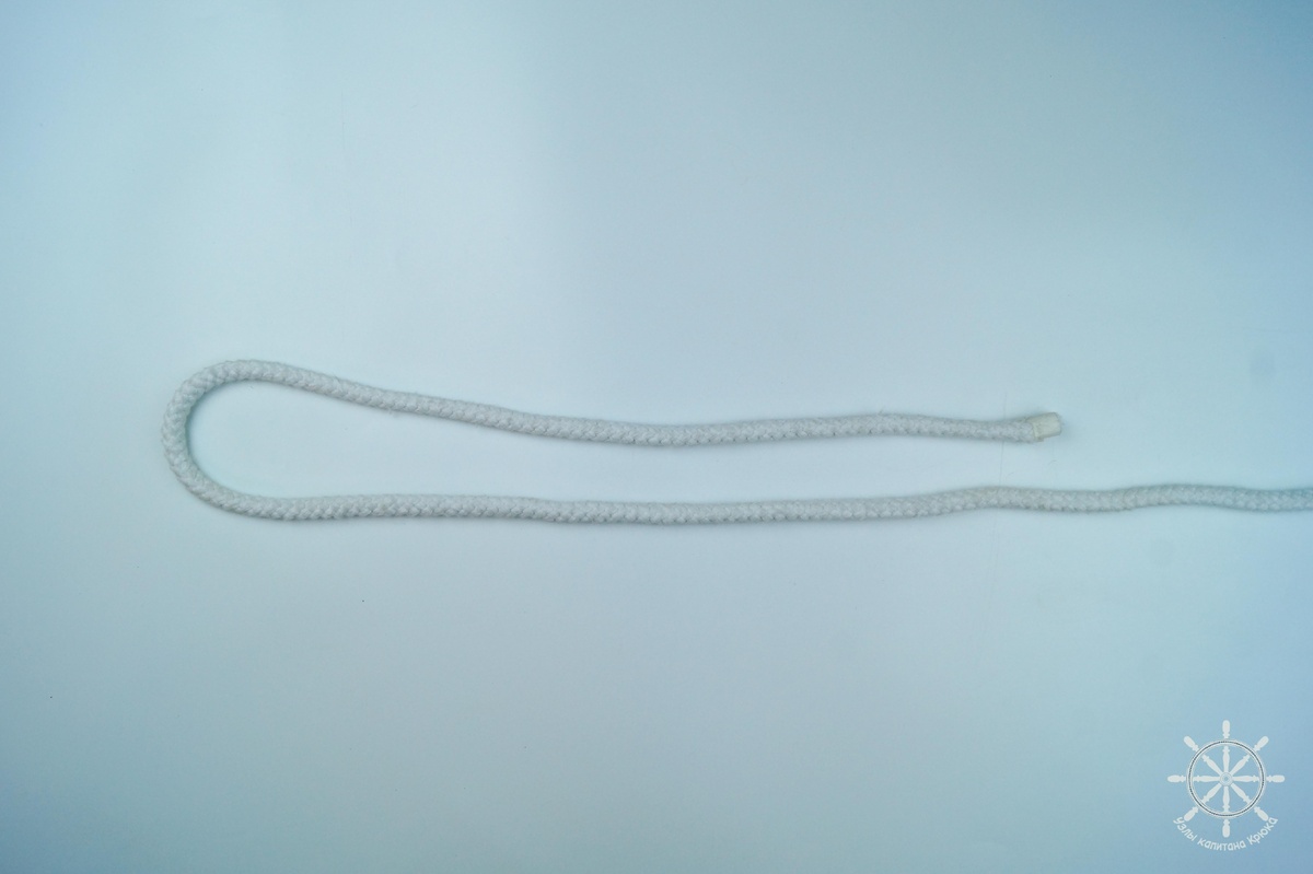 Как вязать строительную петлю с тремя шлагами - шаг 1