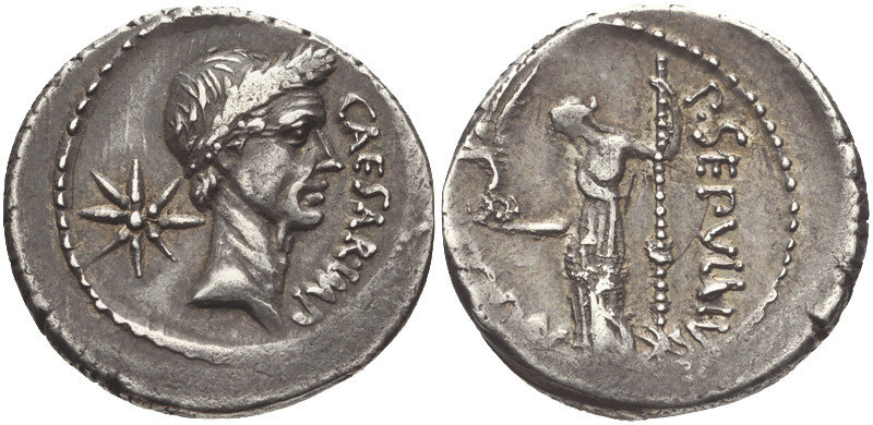 Римская монета на которой рядом с головой Цезаря изображена комета. Цезарь изображен  рядом с кометой. 